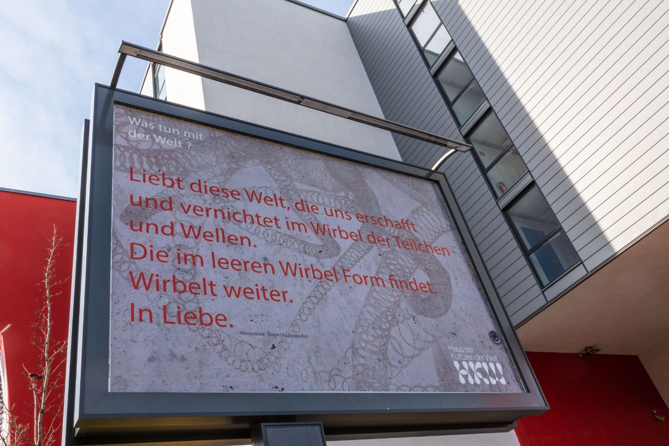 Poster from the campaign What to do with the world?, 2023. Design: Wolfgang Tillmans with a quote from Manjushree Thapa &copy; Haus der Kulturen der Welt.
