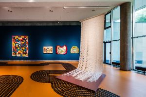 Truong Cong Tung, Blind Map (2023), canvas roll eaten by termites, 600 x 150 cm, Courtesy of Post Vidai Collection. Installation view of the exhibition, Haus der Kulturen der Welt (HKW), 2023.
