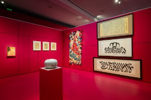 Exhibition view&nbsp;with works by [left to right] Yuji Tamaki, Massao Okinaka, Sachiko Koshikoku, Haji Noor Deen Mi Guangjiang; [foreground] Akinori Nakatani&nbsp;
